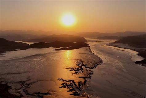 河南孟津：黄河河床呈现造型各异图案 - 国家公园 - 人民周刊网—主流舆论融合传播平台