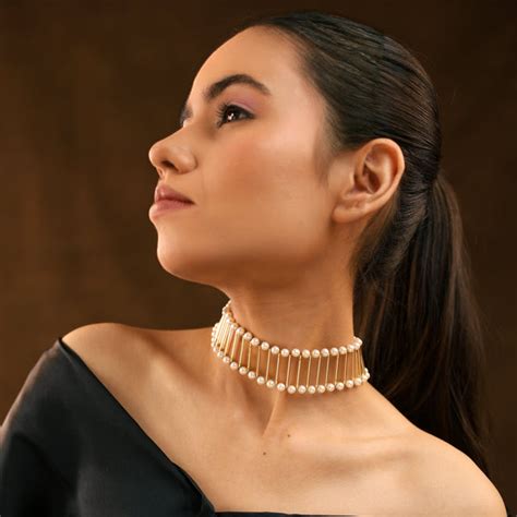 Golden Elegance Pipe & White Pearl Choker – Gouri Jewel's