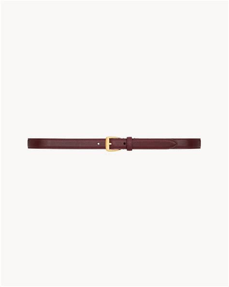 trapezoid thin belt in leather in Bordeaux | Saint Laurent | YSL EN-US