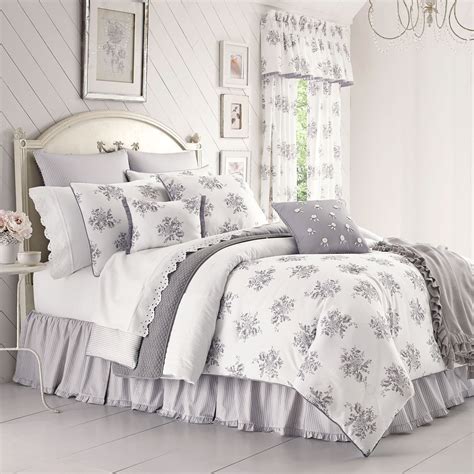 gray and white comforter - Ways to Make Your Home Look Elegant on a Budget