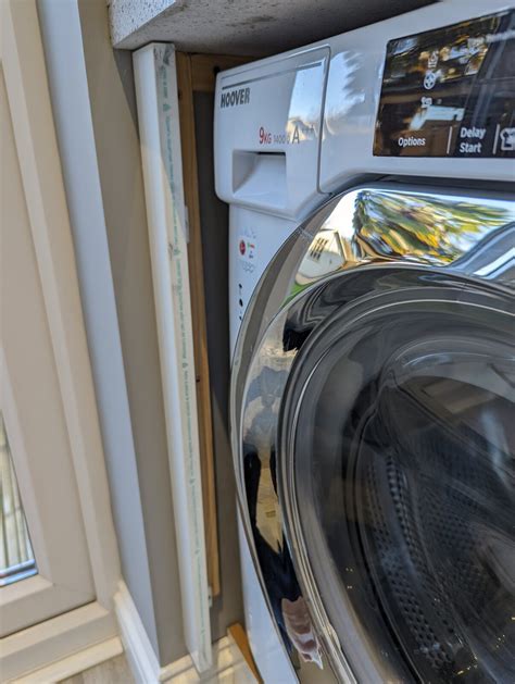 Fitting a Door to an Integrated Washing Machine 的图像结果