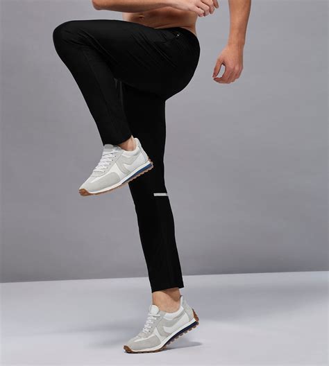 Men Solid Slim Fit Sports Trackpants with DURACOOL+