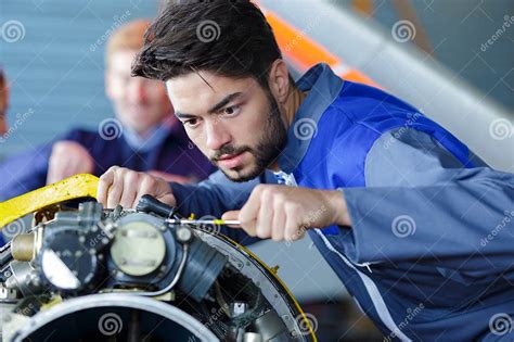 Image result for An Engineer Fixing Machine