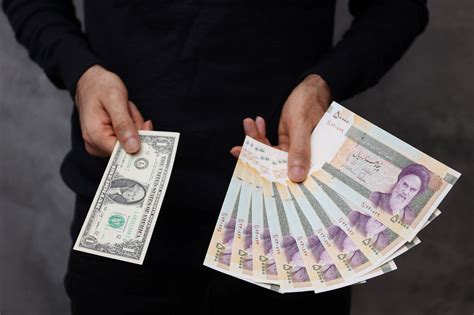 Iran currency slips to new lows amid U.S., Europe tensions | Reuters