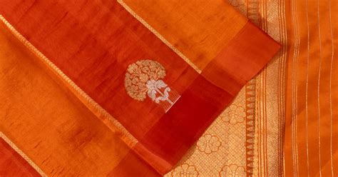 Organza Lines And Butta Red And Orange Saree