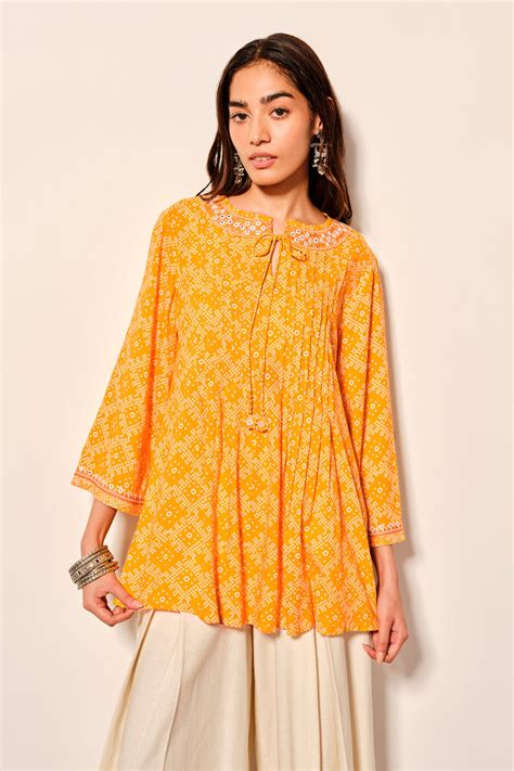 Buy Mustard Peplum-Style Viscose Top Online for Women from Globaldesi ...