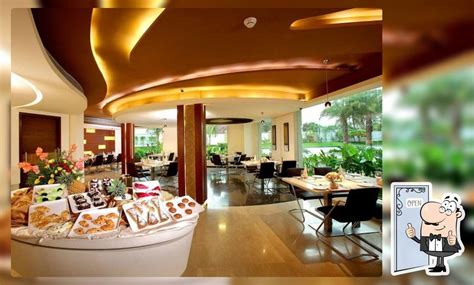Blue Bell Multi Cuisine Restaurant - Flora Airport Hotel, Kochi ...