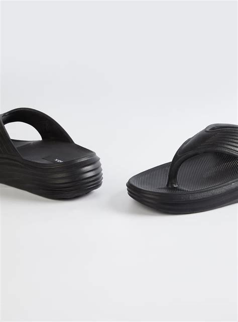 Buy Men Textured Flip Flops Online at just Rs. 399.0 - 1000016339810 ...