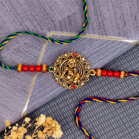 Send Two Rakhi Sets of Designer Rakhi and Antique Rakhi Online ...