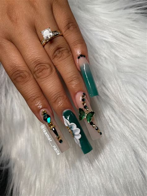 gold nails with emerald green