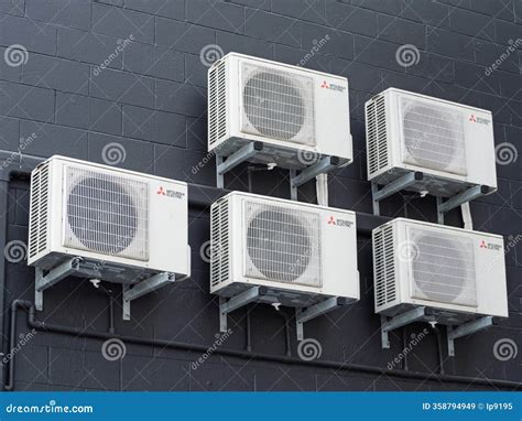 Mitsubishi Electric Air Conditioning Units Mounted at Dark Exterior ...