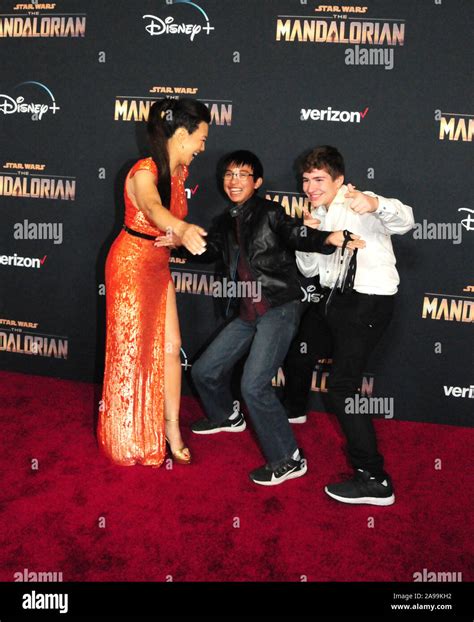 Hollywood, California, USA 13th November 2019 Actress Ming-Na Wen, son ...