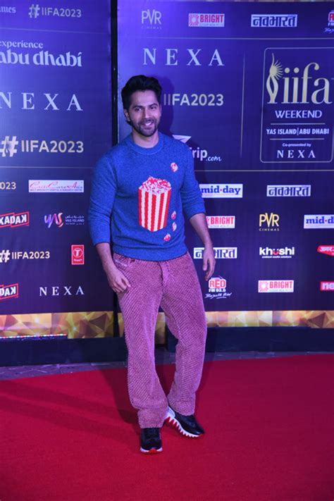 Varun Dhawan Kicks Winter Blues Away In A Popcorn Sweater & Some Heeled ...