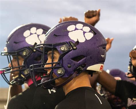 Lee County and LaBelle High School football team helmet photo gallery