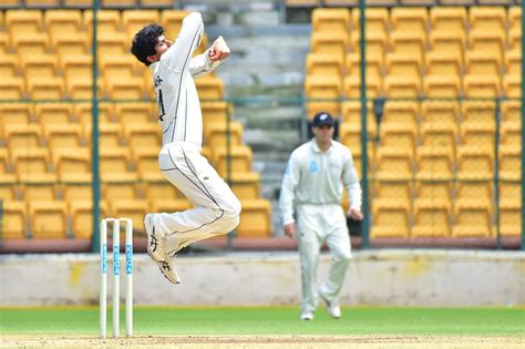 Rachin Ravindra in his bowling action | ESPNcricinfo.com