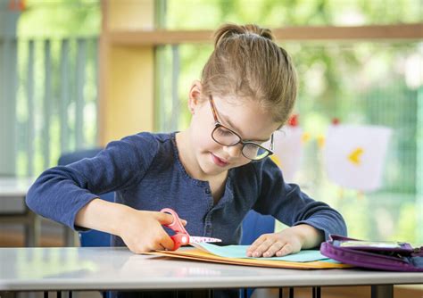 Image result for Child Using Scissors