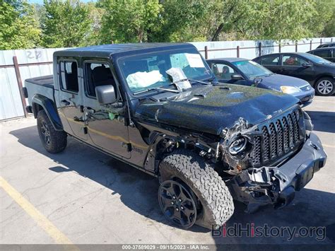 Report 1C6JJTAM9NL158404 JEEP GLADIATOR 2022 Black Diesel - price and damage history