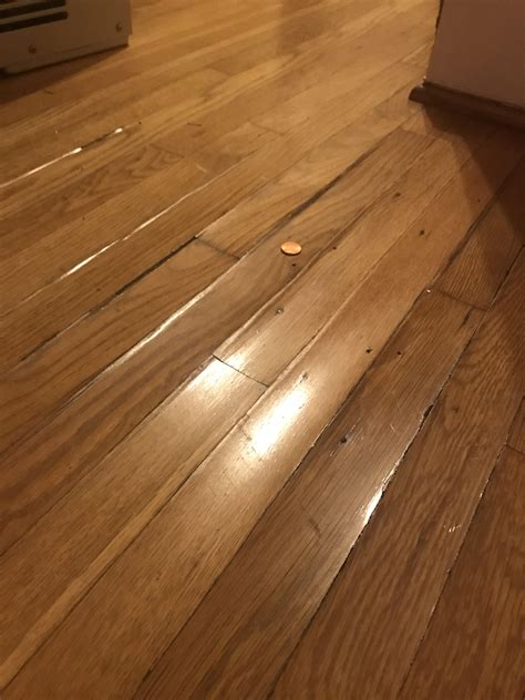 HELP! Warped floorboards - I recently discovered my friend put up a ...