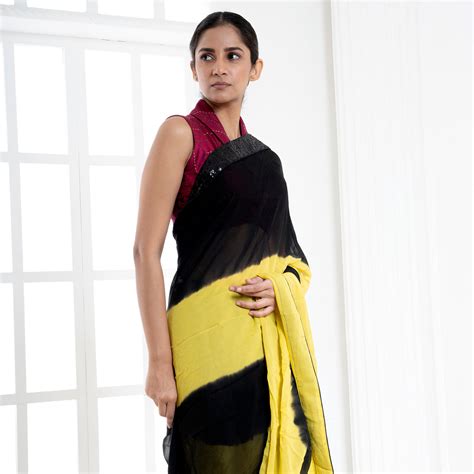 Yellow and black tie and dye georgette saree with sequin border – Boveee