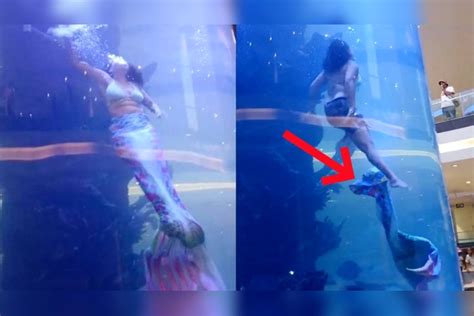 实拍：南非一美人鱼表演者要换气时突发意外 挣脱服装惊险自救！