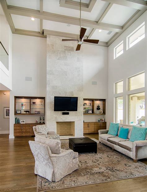 Floor to ceiling fireplace wall | Living room ceiling fan, Living room ...