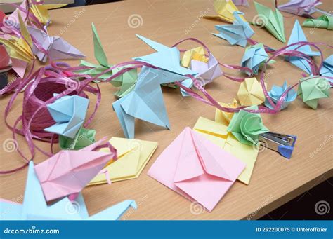 Origami Paper Folding Activities in Progress Showing Finished Colored ...