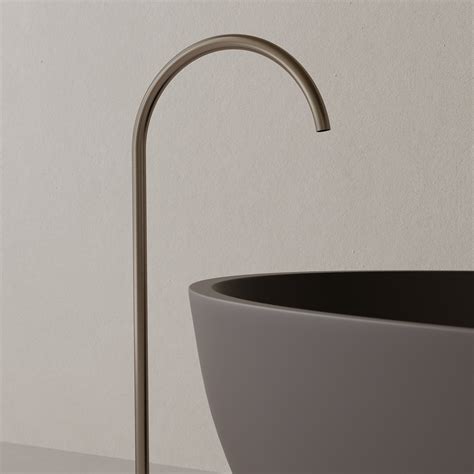 MODERN HIGH ARC FLOOR-MOUNTED BATHTUB FILLER – ELEMENTO BATH