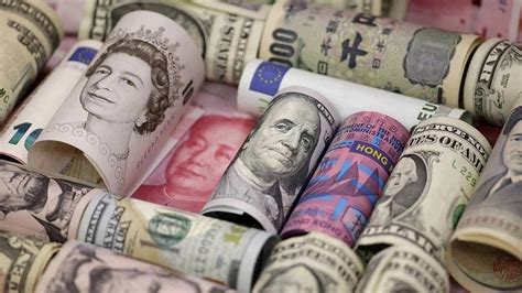 Rupee gains 6 paise to end at 82.70 against dollar