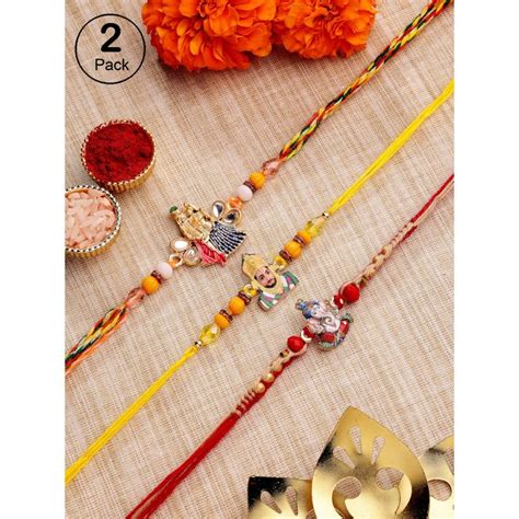 Buy ADIVA Pack Of 2 Kundan & Beads God Symbol Thread Rakhi With Roli ...