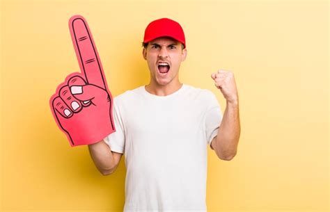 Shouting aggressively with an angry expression | Premium Photo