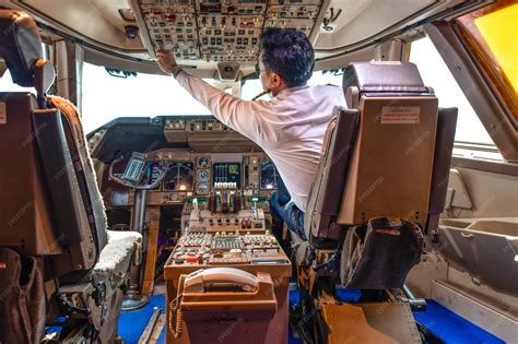 Premium Photo | Airline pilot work in thecockpit