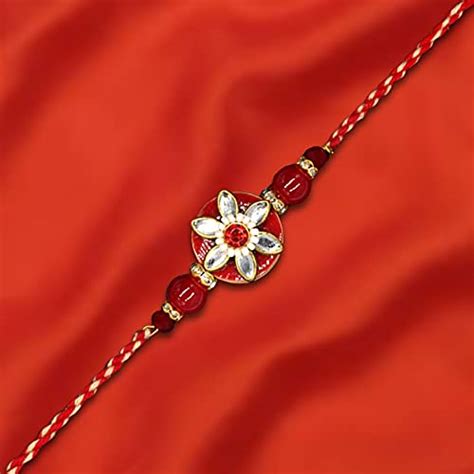 VAISHALI BINDI AND BANGLES Flower Shaped Rakhi Made with Red Meena and ...