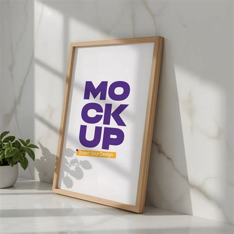 An angled view of a vertical wooden frame mockup leaning against a ...