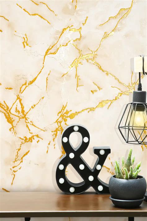 Carrara Beige Marble Effect Wallpaper with Golden Shimmer | Piwall