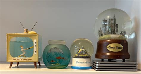 Lot - A Collection of Vintage Snow Globes & Ornaments