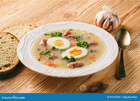 Traditional Polish White Borscht - Zurek, Sour Soup with White Sausages ...