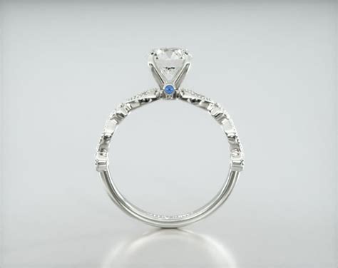 Round & Marquise Shape Diamond Engagement Ring Embellished With a Four ...