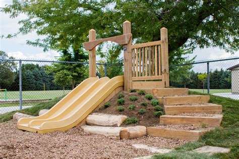 Natural Playground - Hill Slide by APE | Play area backyard, Natural ...