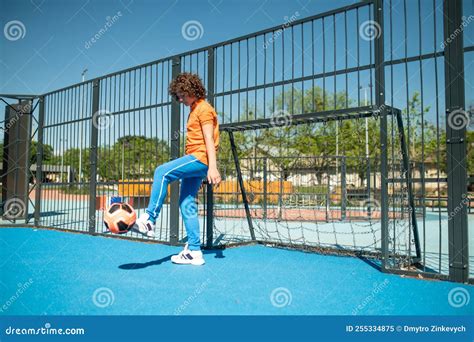 Teenage Boy Playing a Sports Game Outdoors Stock Image - Image of ...
