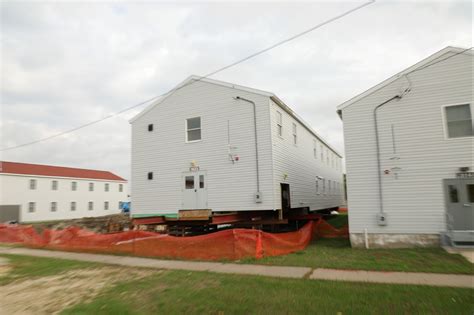Work to build new foundations for relocated World War II-era barracks ...
