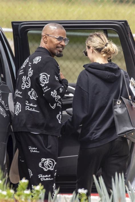 Jamie Foxx holds hands with girlfriend during vacation months after health scare (photos)