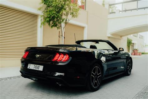 Rent Ford Mustang Black in Dubai - Convertible - Octane.Rent