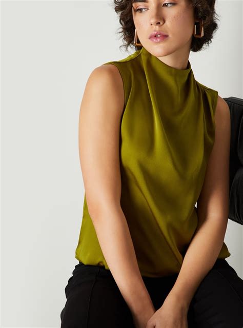 Buy Women Solid Mock Neck Satin Top Online at just Rs. 1099.0 ...