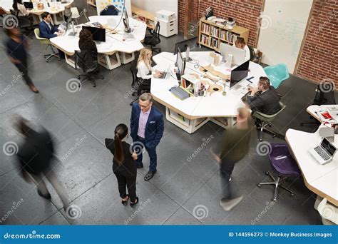 Elevated view of a busy open plan office.