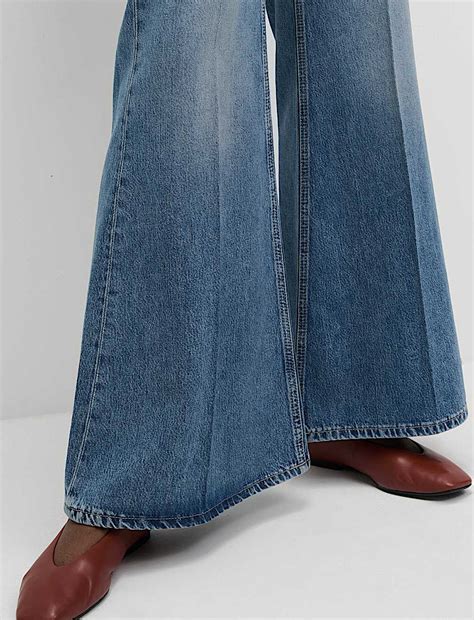 Buy Mid Rise Flared Jeans at Marks & Spencer