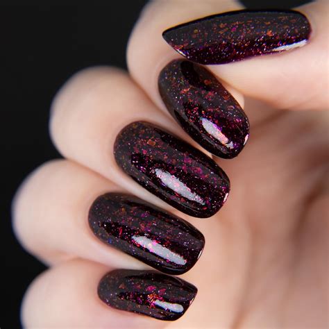 https://www.hairstylery.com/wp-content/uploads/images/43-long-round-dark-burgundy-glitter-nails.jpg