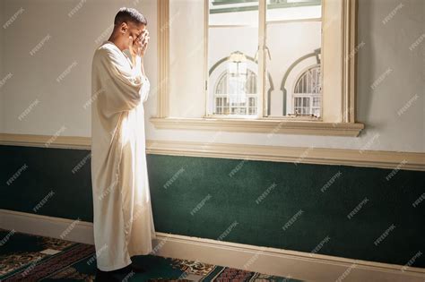 Premium Photo | Muslim prayer or man in a mosque praying to allah for ...
