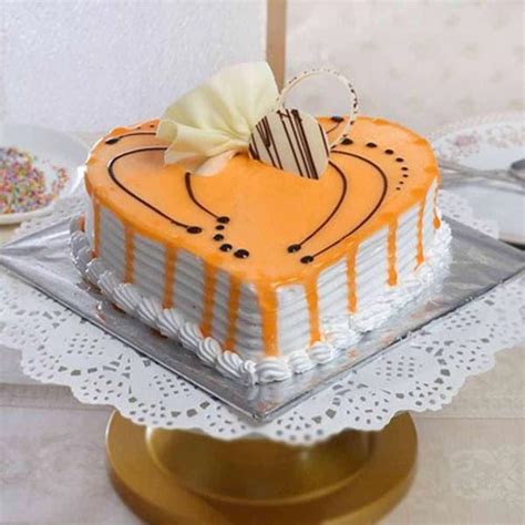 Send Heart Shape Cream Mango Cake Online - GAL22-109328 | Giftalove