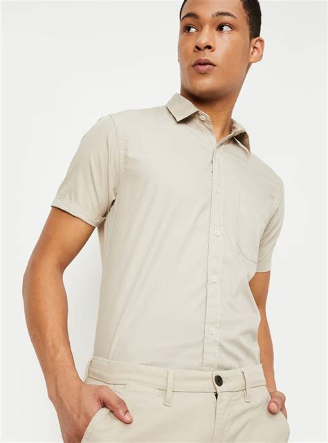 Buy Men Solid Slim Fit Casual Shirt Online at just Rs. 799.0 ...