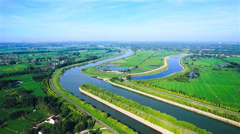4K航拍自然风景乡村农田灌溉渠河流视频模板下载 - 觅知网